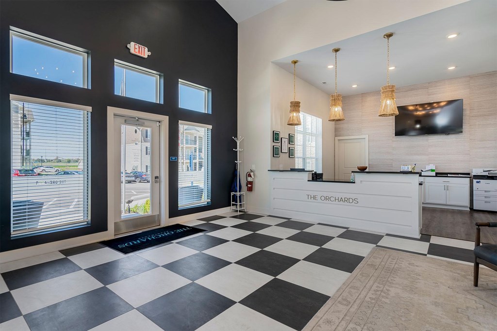 A black and white checkered floor in a reception area.