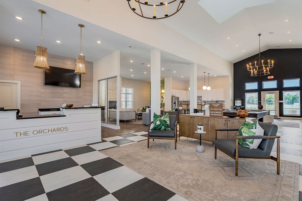 A reception area with a black and white checkered floor.