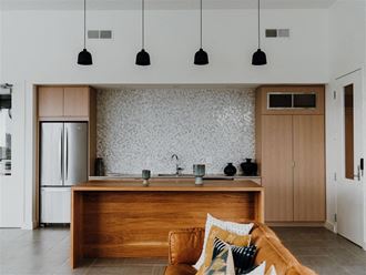 a kitchen or kitchenette at aoa apartments la catedral
