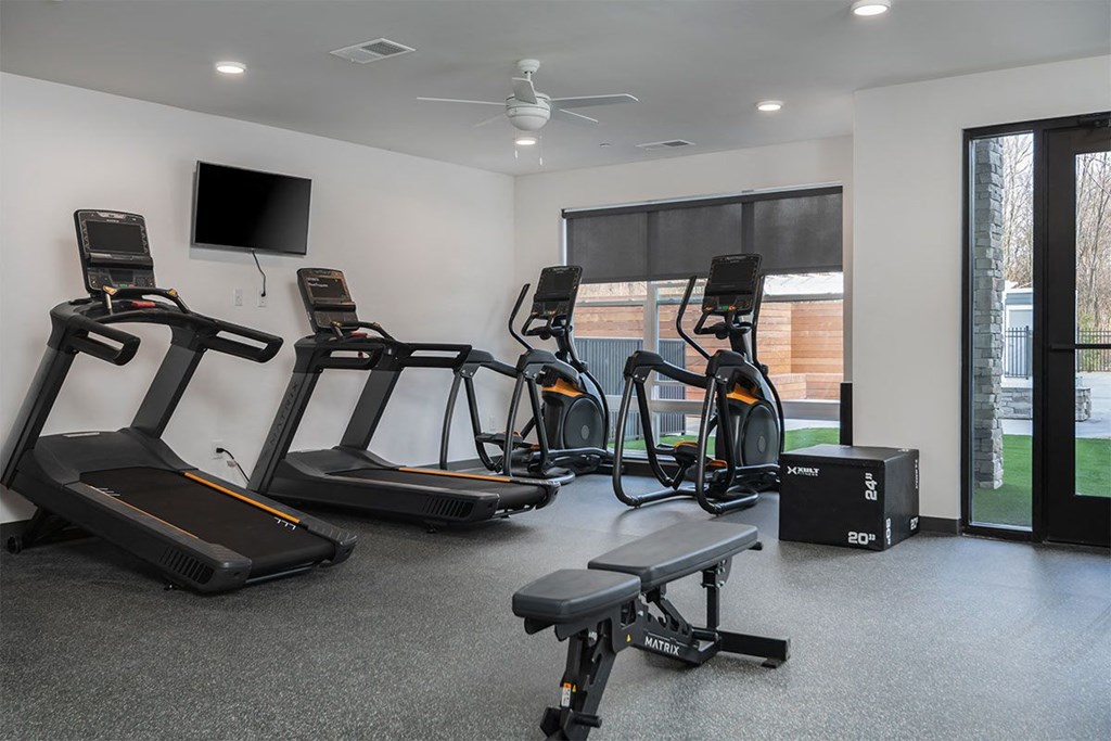 the gym at the monarch luxury apartments