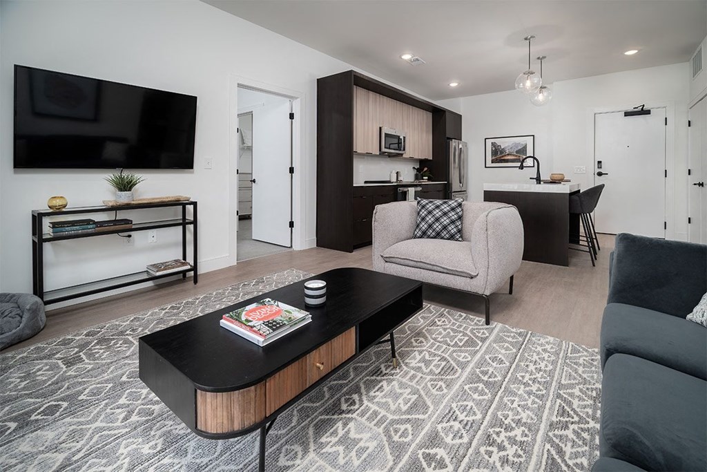 a living room with a couch and a table
