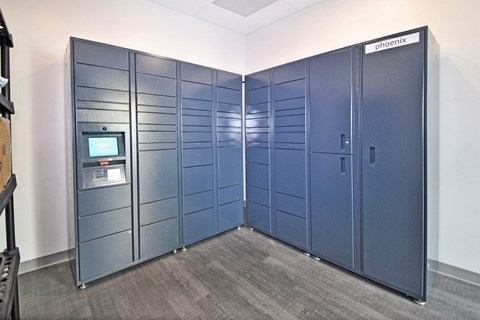 A row of Phoenix branded storage units are lined up in a room.