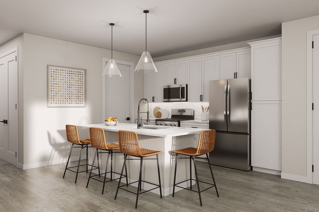 A modern kitchen with a white table and orange chairs.