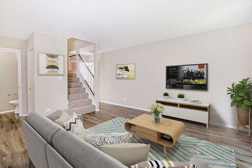 a living room with a couch and a table