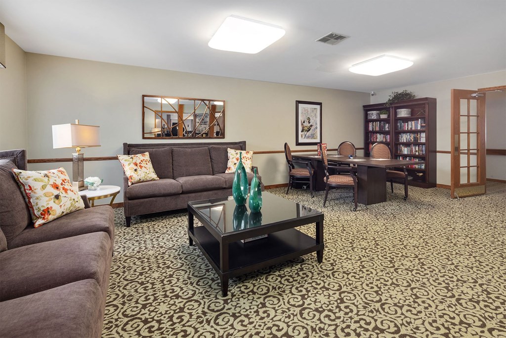 a living room with couches and a table