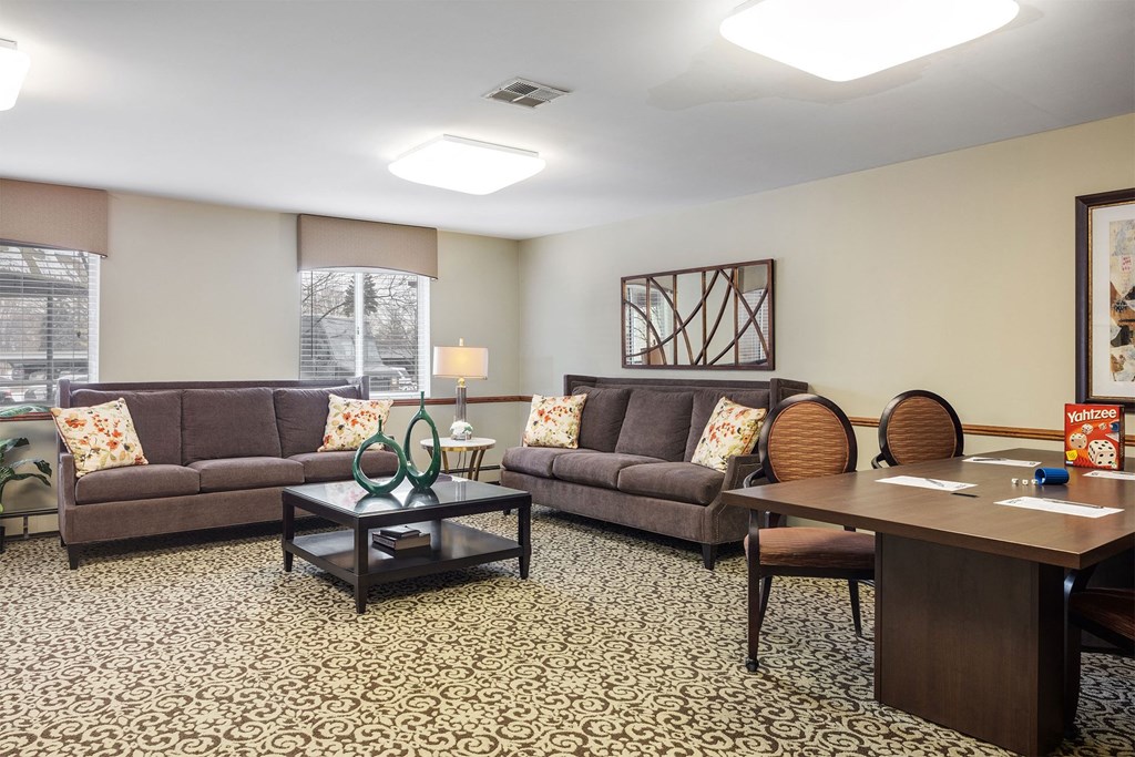 a living room with couches and a table