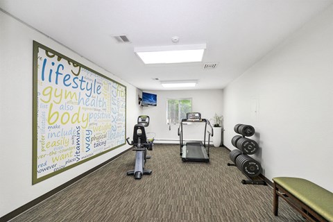 the gym at the preserve at polk apartments