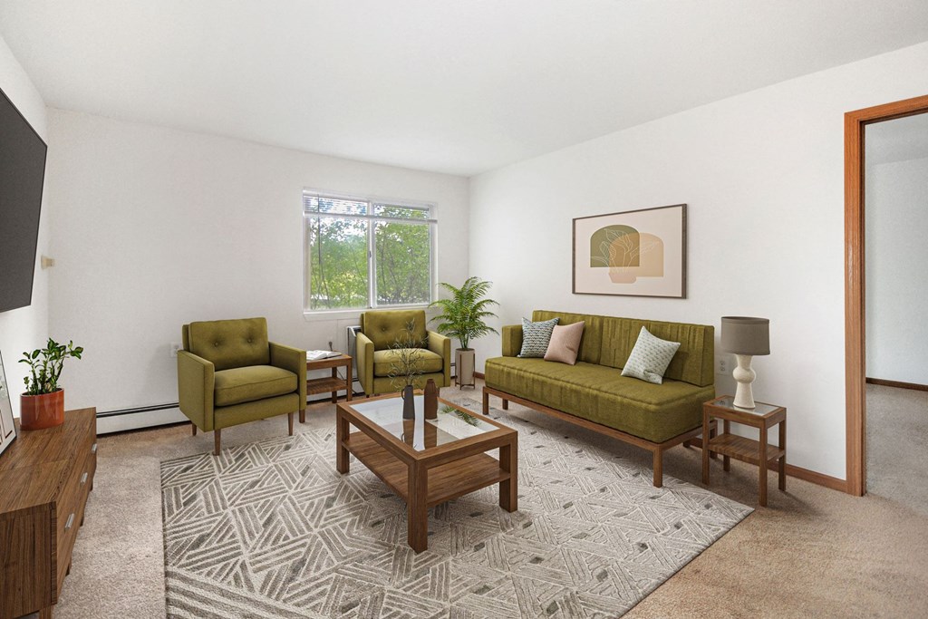 living room with sofa chairs and coffee table