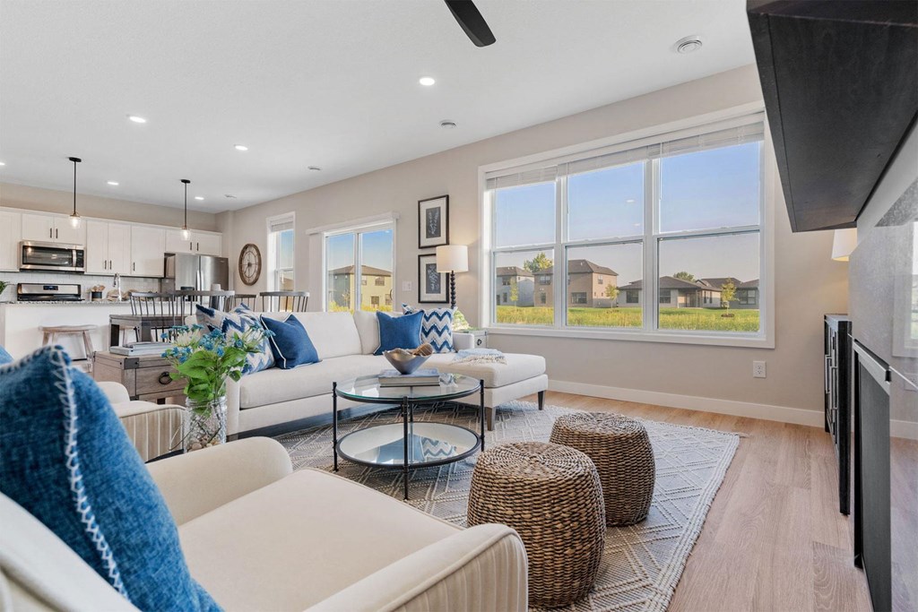 a living room with couches and a table