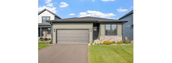 a garage door in front of a house