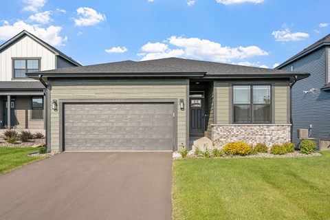 a garage door in front of a house