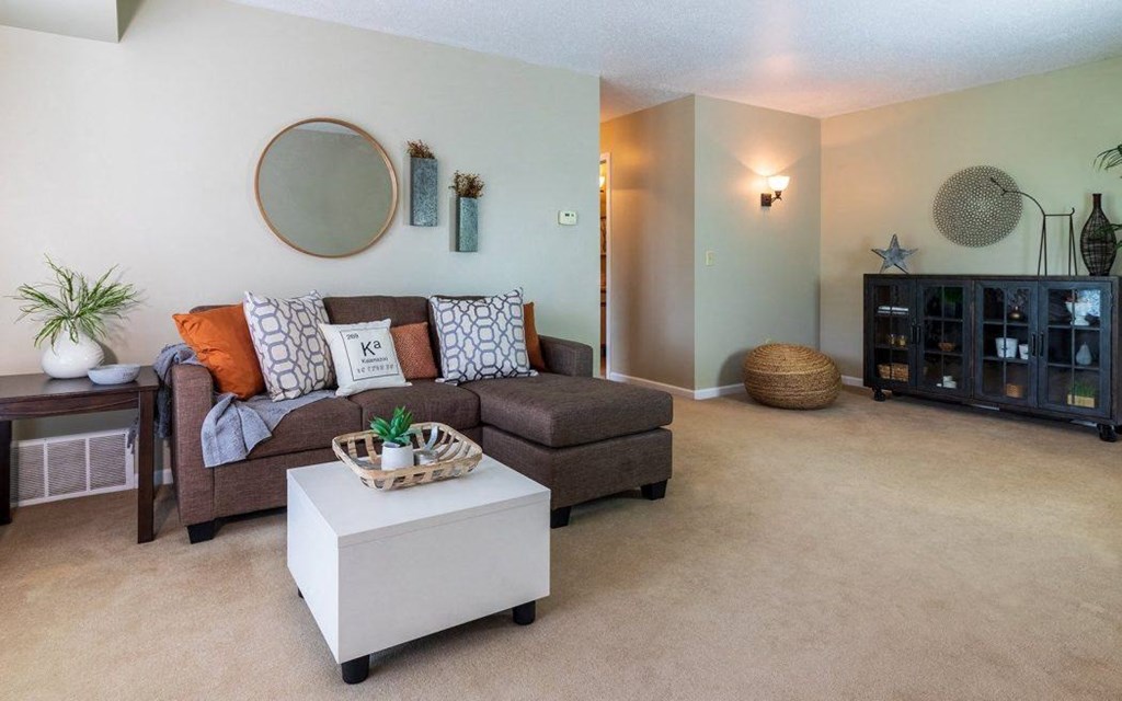 a living room with a couch and a coffee table