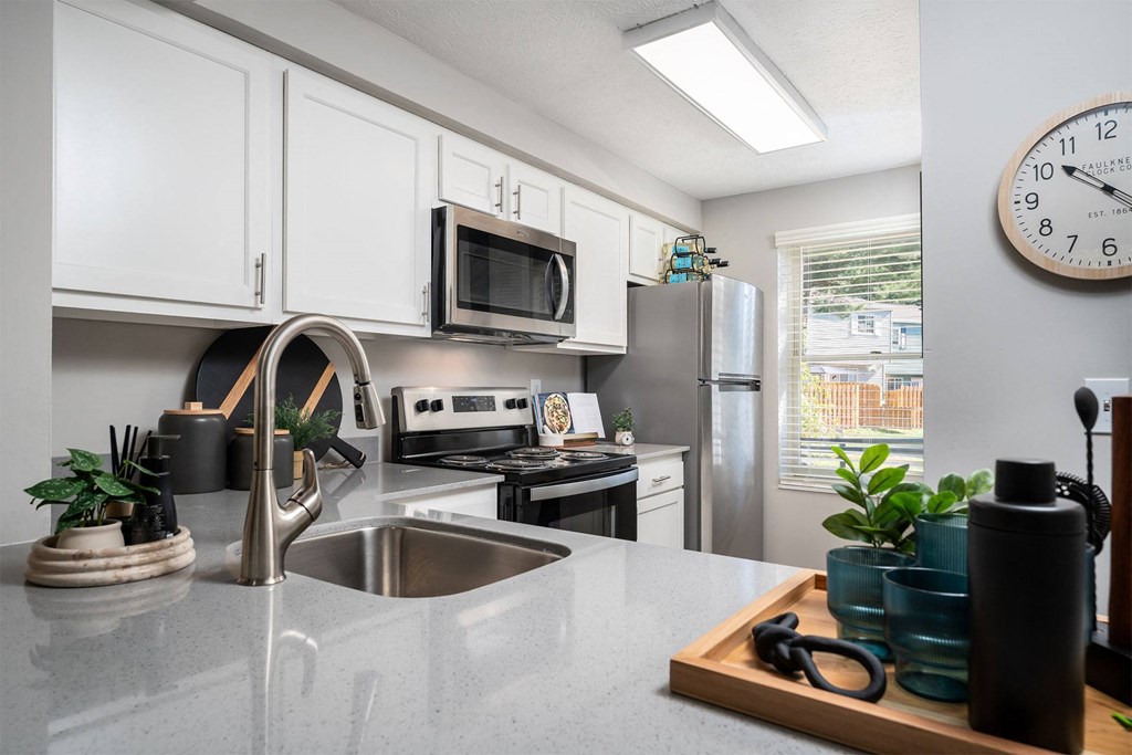 kitchen with white cabinets and stainless steel appliances