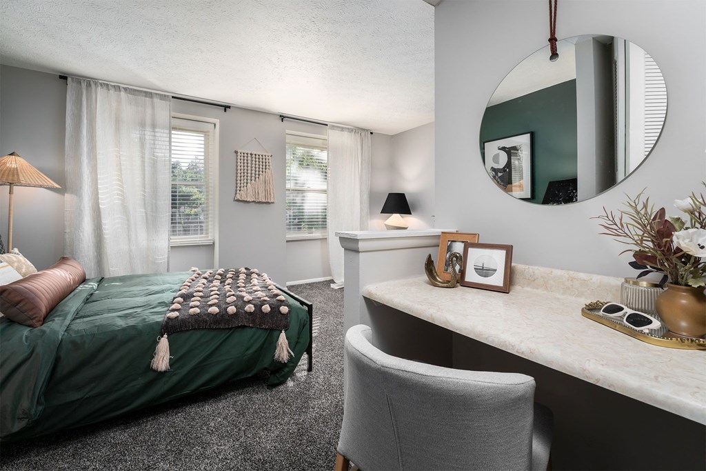 bedroom with desk nook and a bed