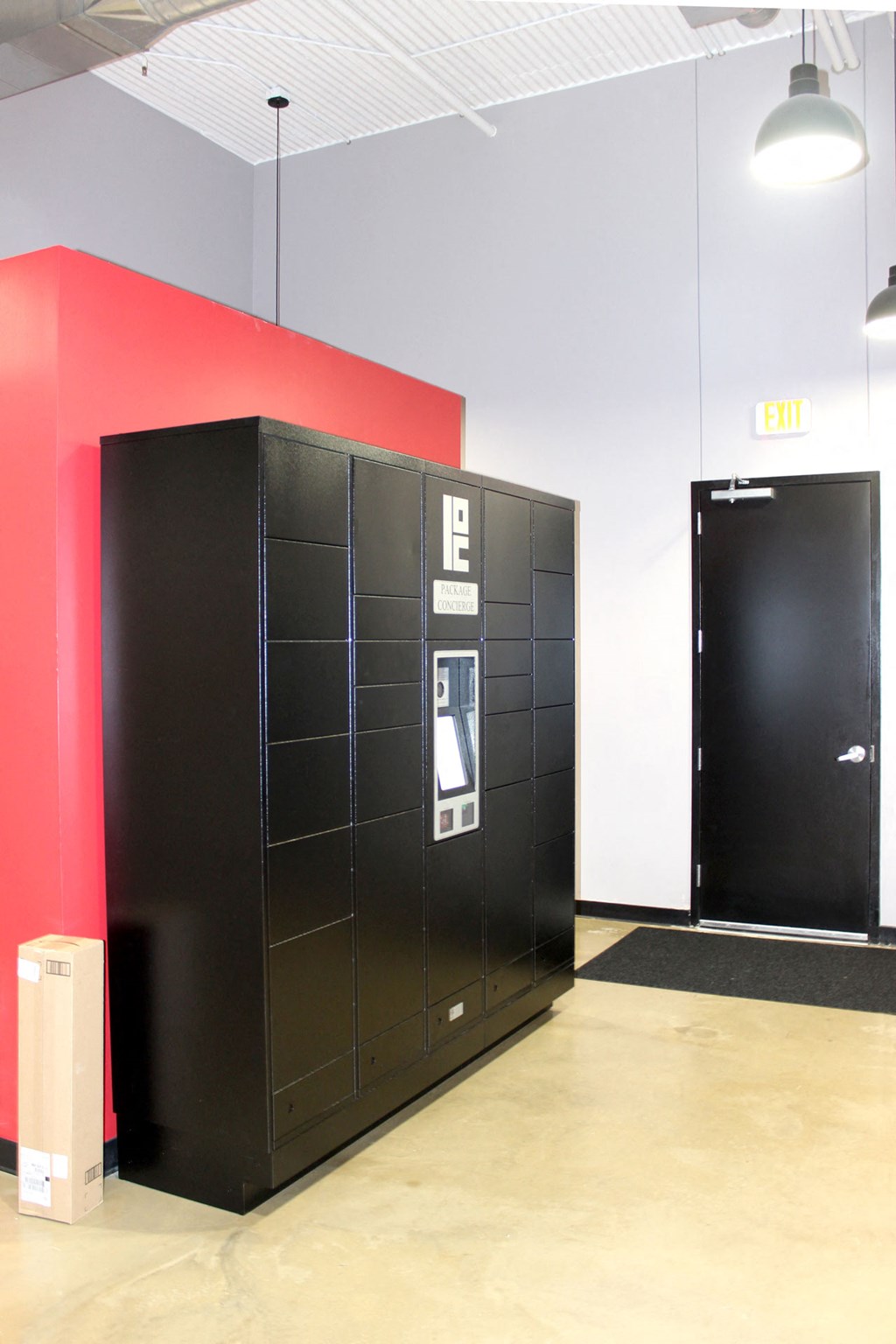 A black filing cabinet with a white label on it.