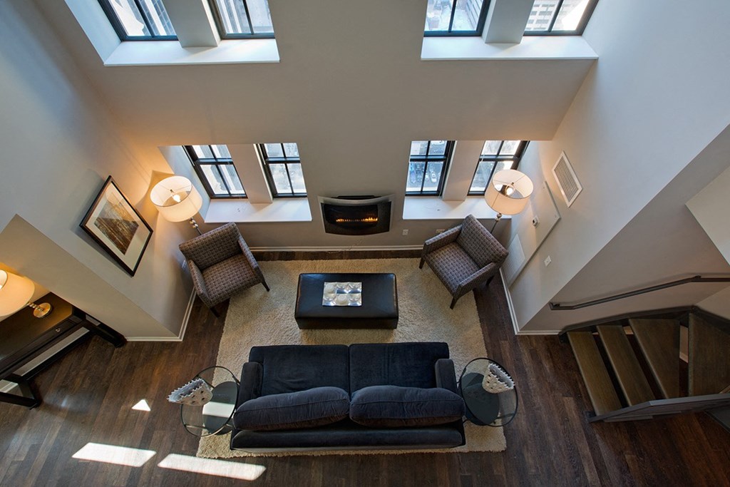 a view of the living room from the loft of a house