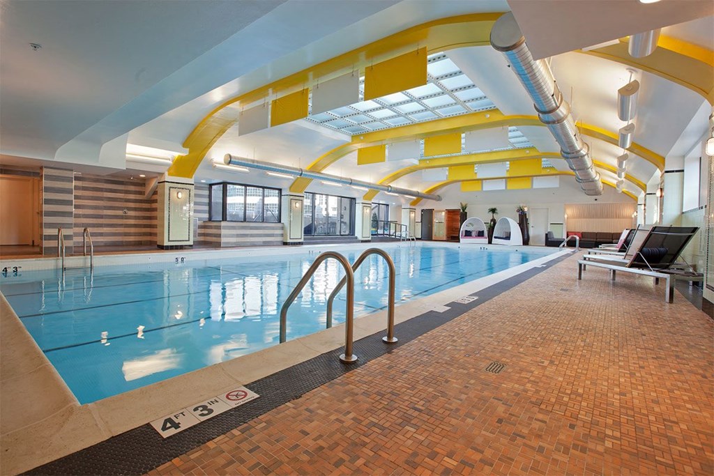 a swimming pool at a hotel with a large pool