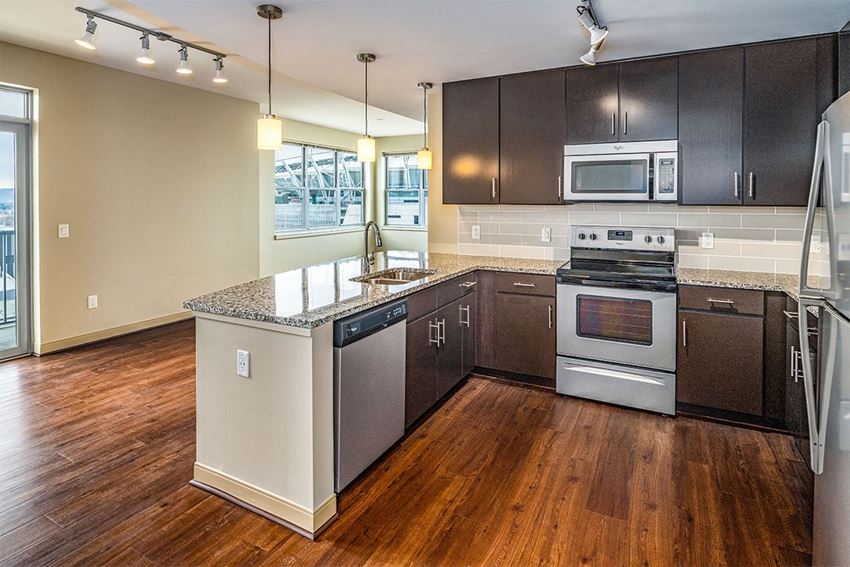 radius at the banks apartments kitchen with peninsula - Photo Gallery