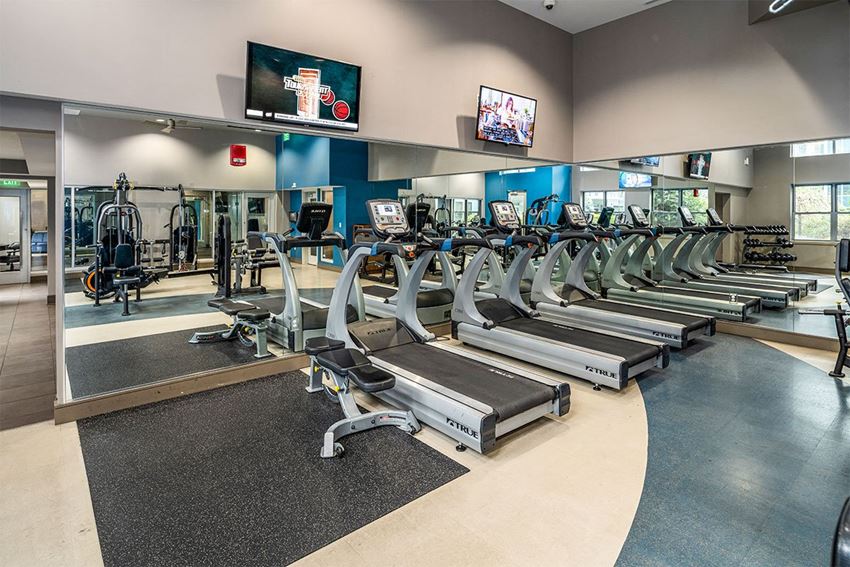 radius at the banks apartments fitness center with running equipment - Photo Gallery