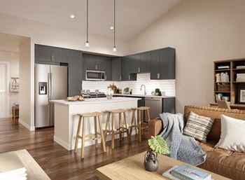 a kitchen and living room in an apartment