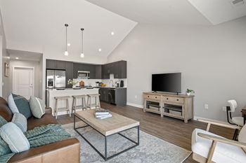 a living room with a couch and a table