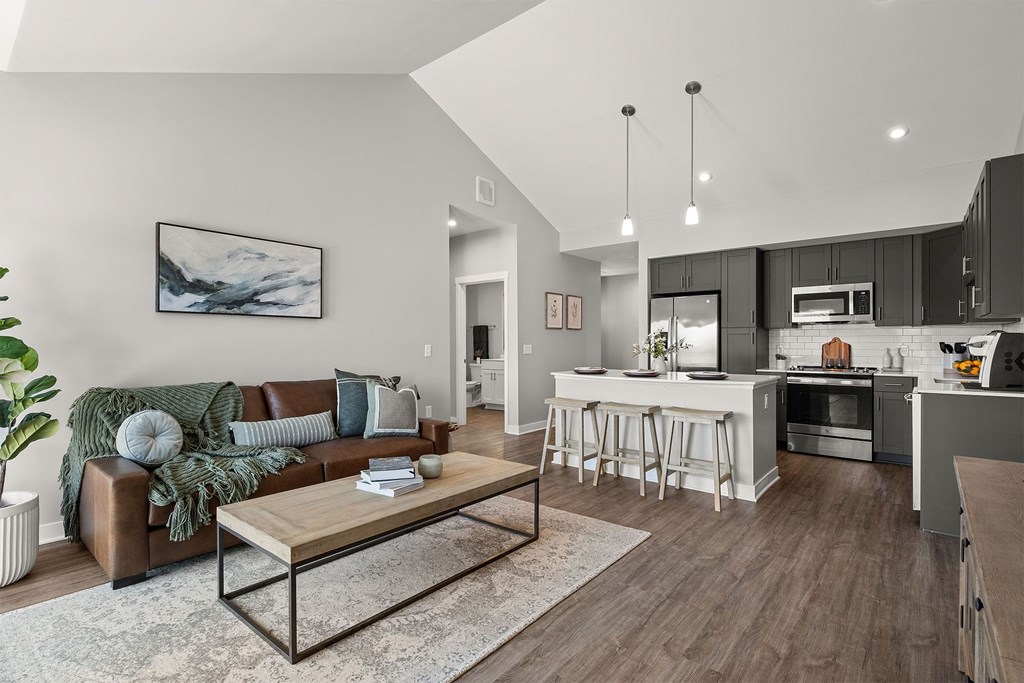 a living room with a couch and a table