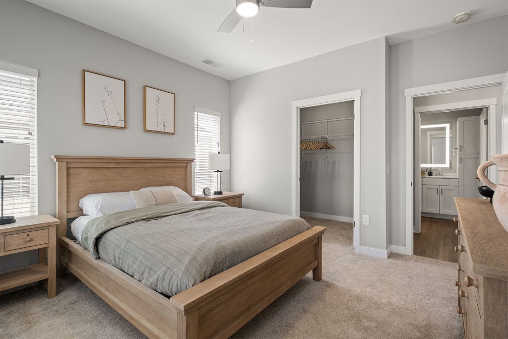 a bedroom with a bed and a closet