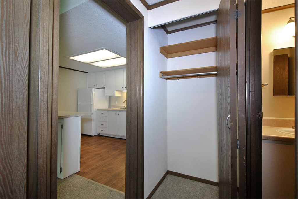 A view into a kitchen from a hallway.
