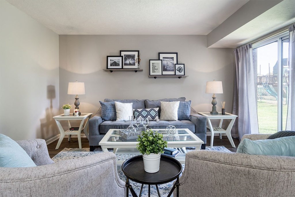 a living room with a couch and a table