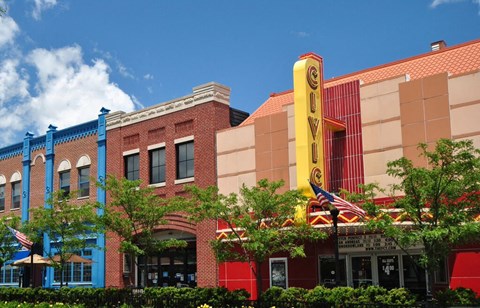 A building with a yellow sign that says "CITY" on it.