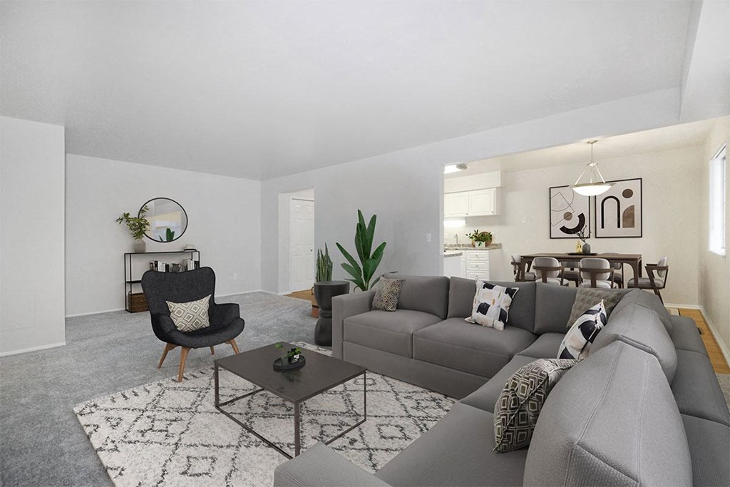 a living room with a couch and a table