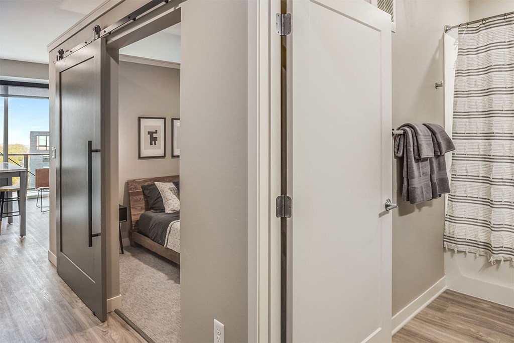 The Asher apartments bathroom and bedroom