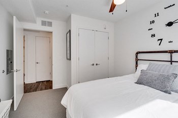 The Donegan Saint Paul Apartments Bedroom with Closet - Photo Gallery 8