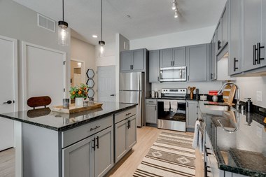 the isaac apartments roseville minnesota kitchen with island