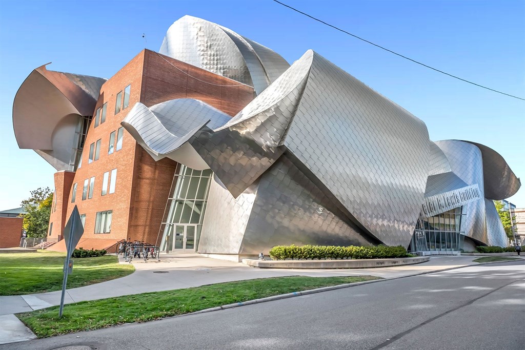 A modern building with a unique design is shown.