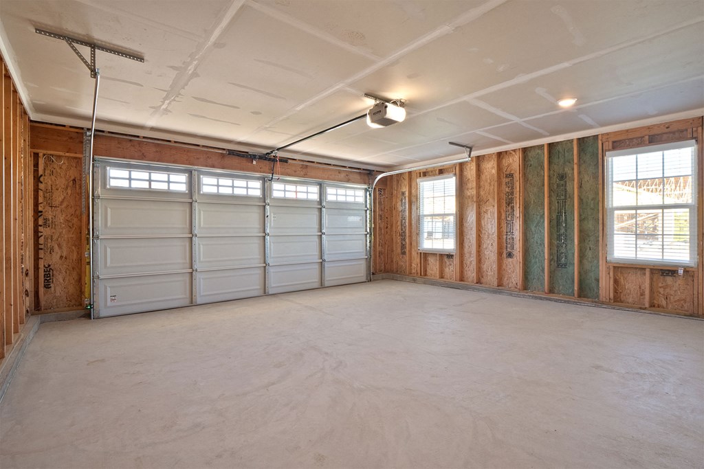 the garage is empty and ready to be remodeled