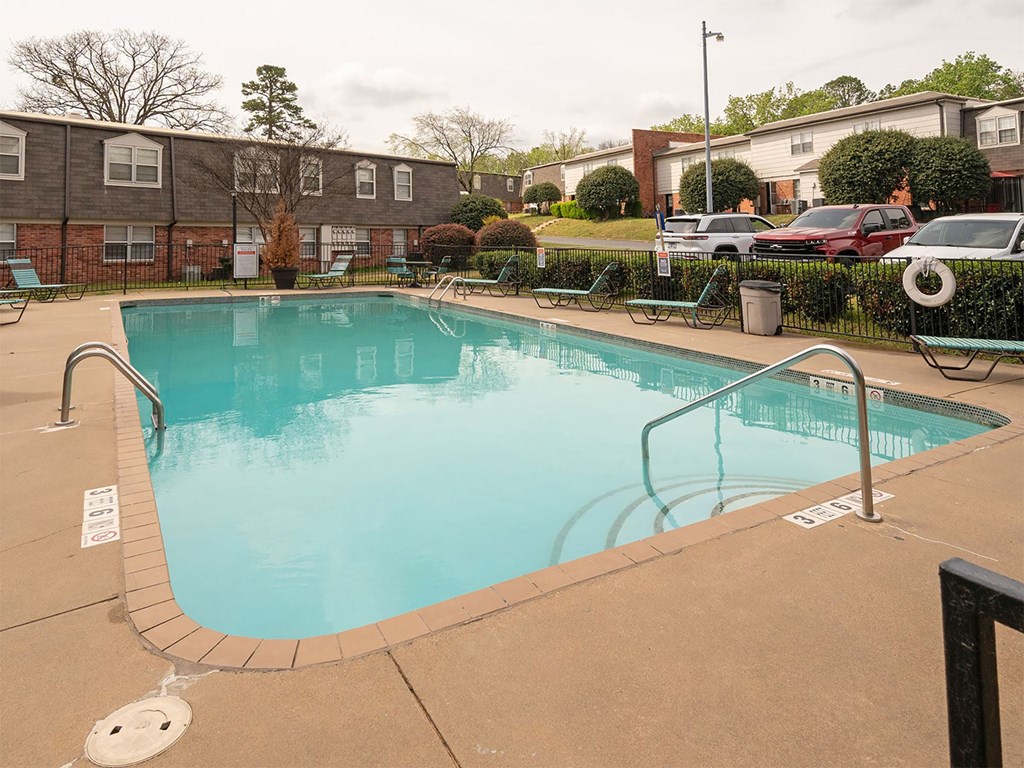 A small pool with a brownish tiled edge.