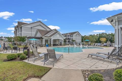 A large house with a pool in the backyard.