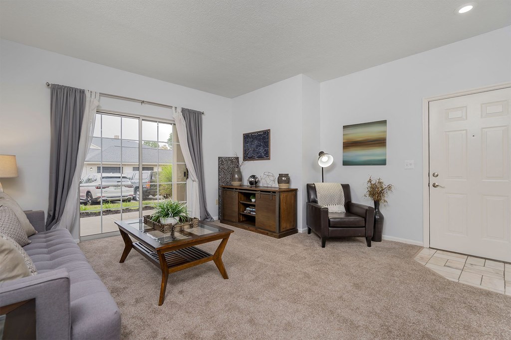 a living room with a couch and a table