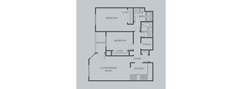 A floor plan of an apartment with two bedrooms, a living/dining room, a kitchen, a foyer, and storage.
