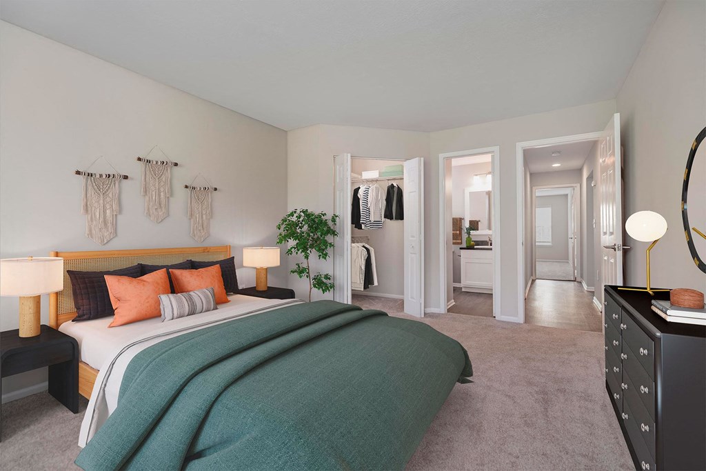 a bedroom with a bed and a closet