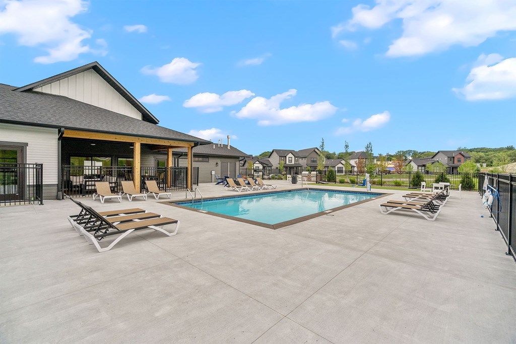 the estates at tanglewood|pool with lounge chairs and sun loungers