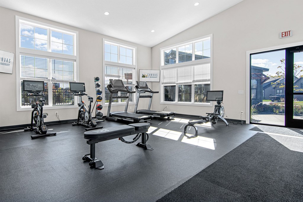 the gym at the enclave at woodbridge apartments in sugar land, tx