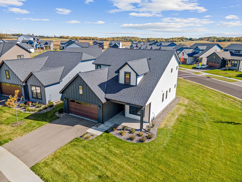a house in a subdivision with a gray roof