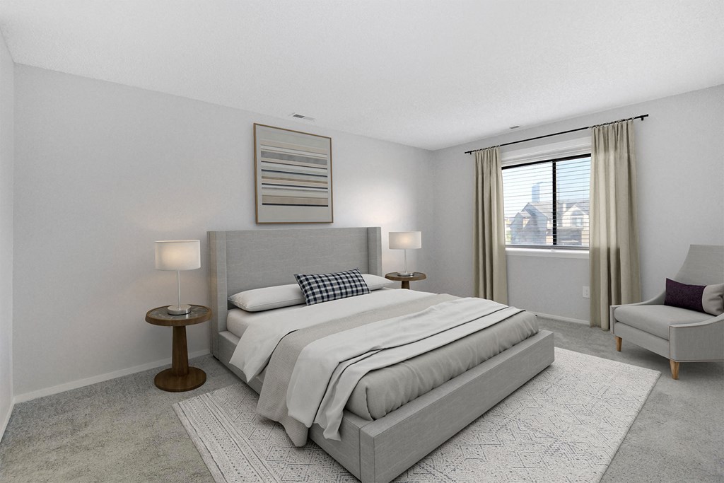 a white bedroom with a bed and a window