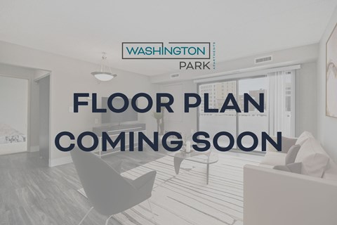 A room with a sign that says "Floor Plan Coming Soon" in front of a window.