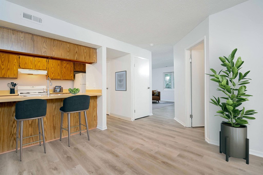 a kitchen and dining area in a 555 waverly unit