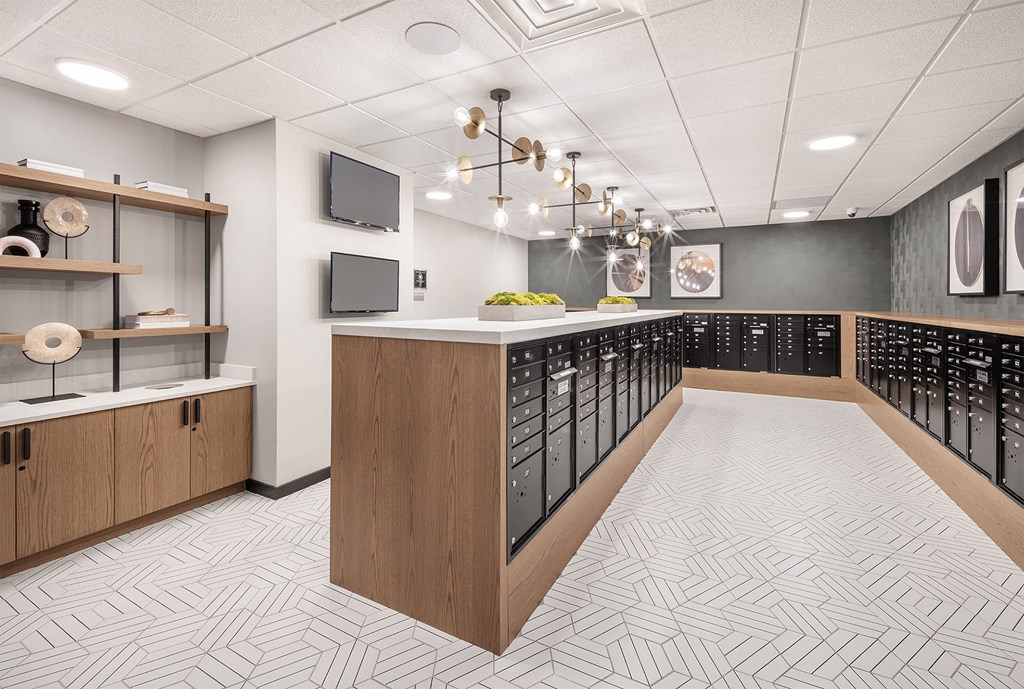 a communal area in a locker room with a row of lockers