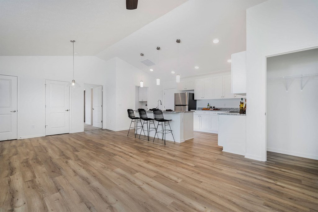 a kitchen and dining area in a 555 waverly unit