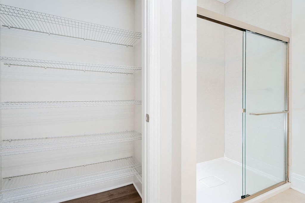 a walk in closet in a 555 waverly unit